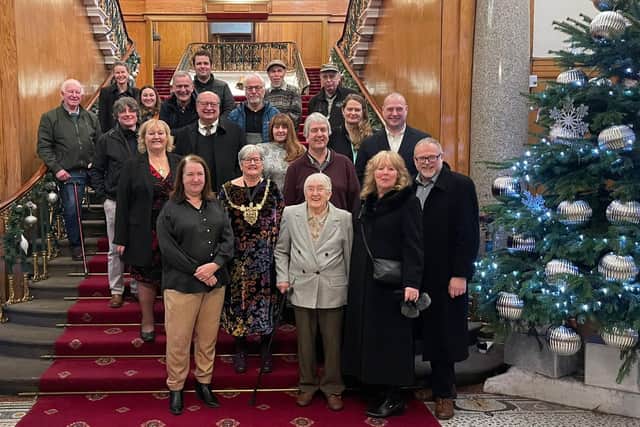 Rosemary Shaw unveiled the memorial to her husband Stan who died last year aged 94, outside the Cutlers Hall, in Sheffield. She is pictured with dignitories inside the Cutles Hall. Picture: Andy Kershaw