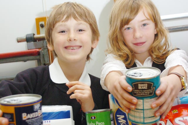 In 2007 children at Copley Junior School held a harvest festival with non-perishable goods, all going to Doncaster's M25 homeless project. L-R are Joshua Paskell, and Darcy Atkinson, both seven