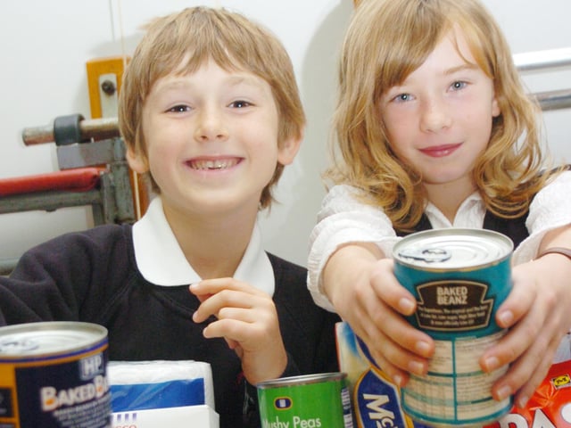 In 2007 children at Copley Junior School held a harvest festival with non-perishable goods, all going to Doncaster's M25 homeless project. L-R are Joshua Paskell, and Darcy Atkinson, both seven