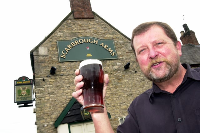 Scarbrough Arms licencee Neil Travis celebrates being voted Doncaster Camra's Pub of the Year 2003.