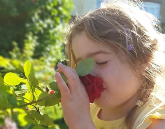 Melody Mills says: "My daughter Tilly smelling the roses in our garden. My favourite photo during lockdown as we’ve been so grateful for our garden - it’s always the little things."