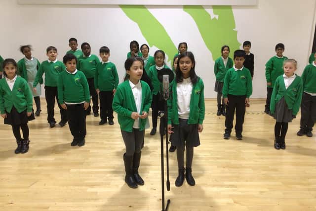 Children at Oasis Academy Don Valley recording their Christmas album