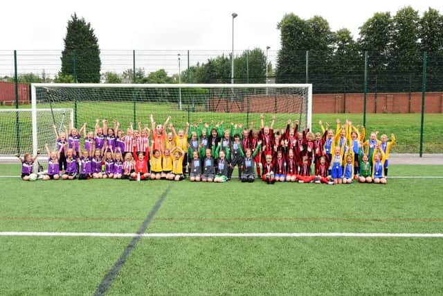 Fifty-six new teams are competing in the Sheffield and Hallamshire Women and Girls League this season. Pictured are participants at a girls' under-8s football tournament organised by the Sheffield & Hallamshire County Football Association.