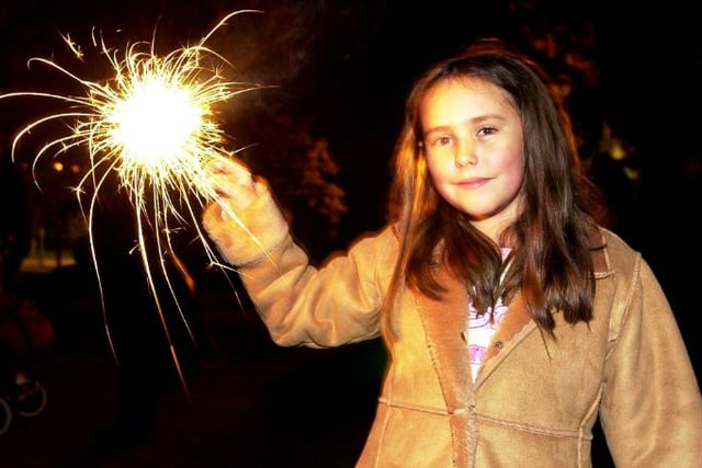 Eight year old Lauren Wheeldon with a sprinkler at the Earth Centre in 2003.