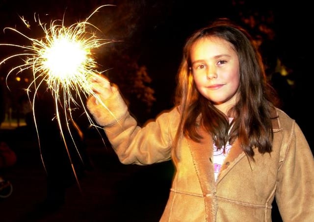 Eight year old Lauren Wheeldon with a sprinkler at the Earth Centre in 2003.