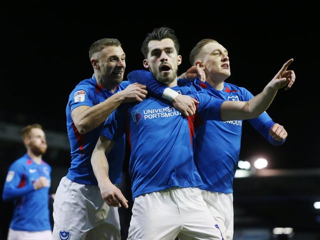 John Marquis celebrates with Lee Brown and Ronan Curtis