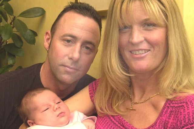 Baby Georgia Bingham with her mum and dad Karen and Roy Bingham at the Sheffield Fertility Centre, Glen Road, Sheffield, where the clinic were celebrating their 2000th IVF baby. in 2002