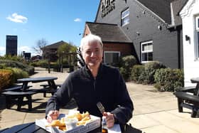 It is Sheffield’s newest fish and chip shop, right next to Sheffield Arena – and we have checked out the wares. David Kessen prepares to tuck in at Papa's fish and chips on Arena Court.