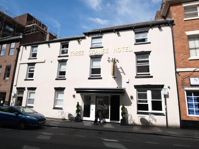 Three Cranes hotel, now the Three Cranes Boutique Hotel & Serviced Apartments, which has maintained the name and facade.