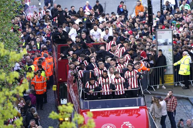 Sheffield United players on an open top parade bus during the celebrations in Sheffield City Centre: Danny Lawson/PA Wire.