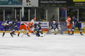Steelers try to force some pressure on the Dundee net. Derek Black