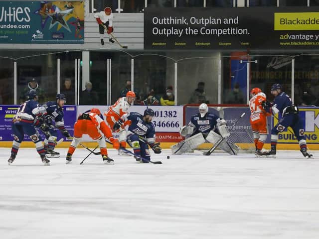 Steelers try to force some pressure on the Dundee net. Derek Black