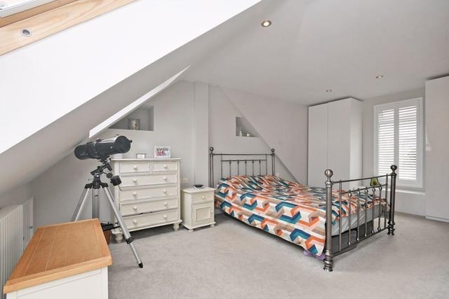 The master bedroom is found in the loft conversion and is the only room with an en-suite.
