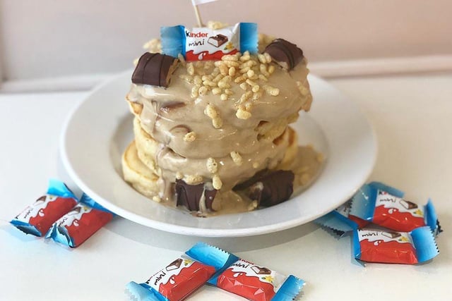 Kinderella pancakes, topped with a sauce of Kinder chocolate and Nutella, topped with Kinder pieces and Coco Pops, priced £7.95.