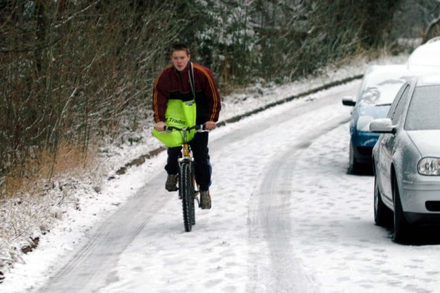 A paper boy cycles through the snow at Nether Green, Sheffield on December 28, 2005, one of the years when we had a White Christmas period