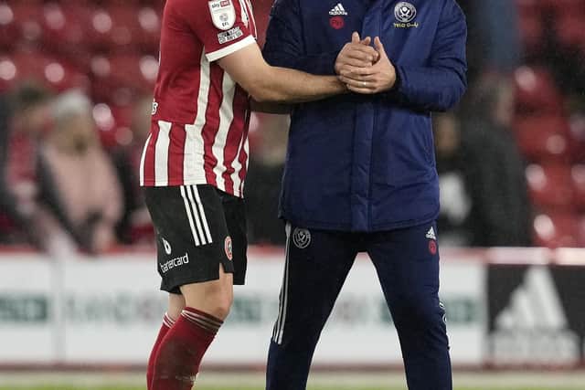 Enda Stevens with Sheffield United manager Paul Heckingbottom: Andrew Yates / Sportimage