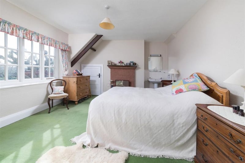 One of the five bedrooms inside of the property which includes charming original and period features.