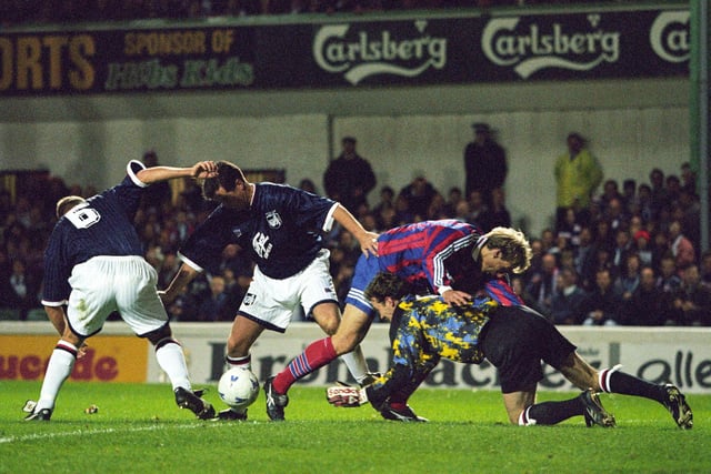 Raith Rovers' defence struggles to scramble the ball clear from danger during October 1995's UEFA Cup second round game at Easter Road in Edinburgh against Bayern Munich. Photo: SNS Group