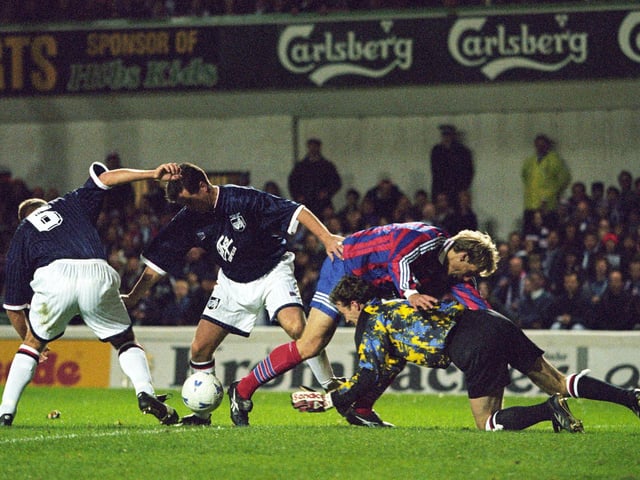 Raith Rovers' defence struggles to scramble the ball clear from danger during October 1995's UEFA Cup second round game at Easter Road in Edinburgh against Bayern Munich. Photo: SNS Group