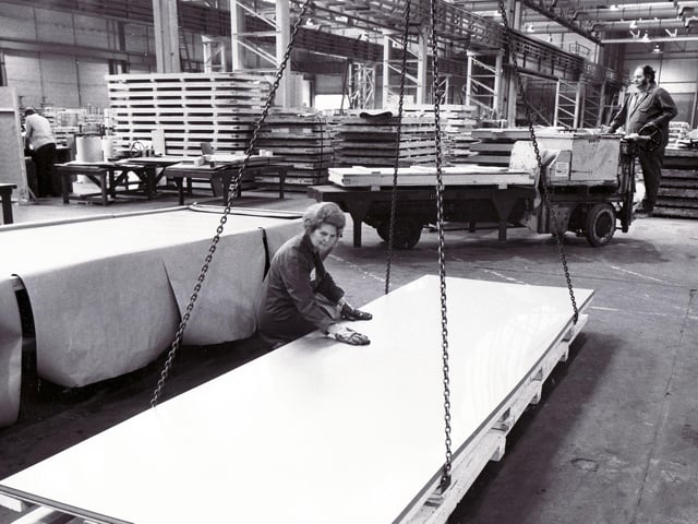 A final inspection of a stainless sheet at the British Steel Corporation in 1985