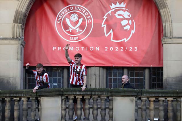 Man City's Tommy Doyle and James McAtee (centre) celebrate promotion with Sheffield United: Darren Staples/Sportimage