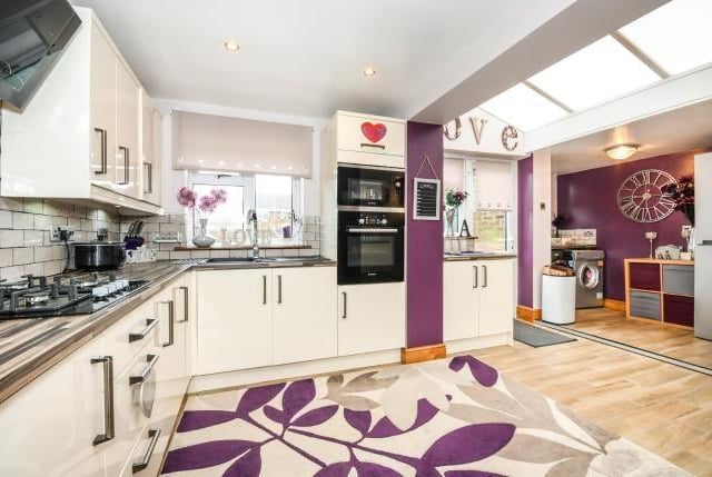 This house has a kitchen/ dining room with utility area.