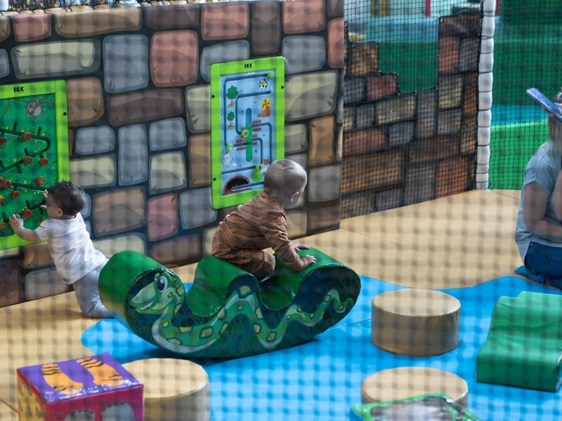 Babies playing in the Toddler area. Picture By: Andy Hornby