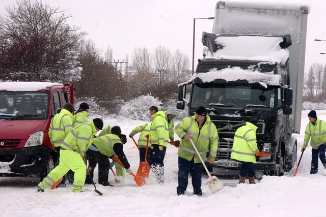 Snow mayhem at Park Springs where lorries are stuck and vehicles are abandoned - December 2010
