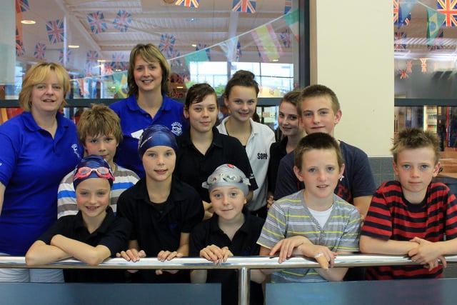 A bunch of Buxton Swimming Club youngsters gather at an event.