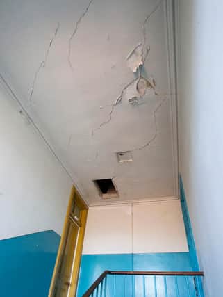 Ceiling damage to communal landing in Beaconsfield Terrace, Hawick. (Photo: Bill McBurnie)