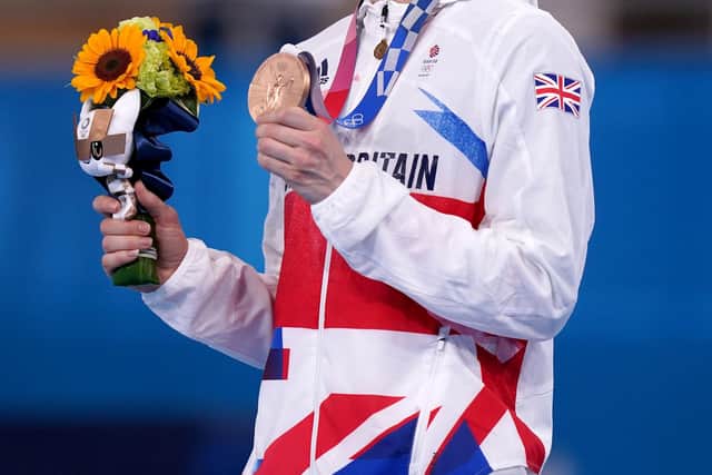 Great Britain's Bryony Page poses with her bronze medal after finishing third in the Women's Trampoline Gymnastics at Ariake Gymnastic Centre on the seventh day of the Tokyo 2020 Olympic Games in Japan.
