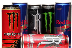 Cans of Red Bull, Monster and Relentless energy drinks.