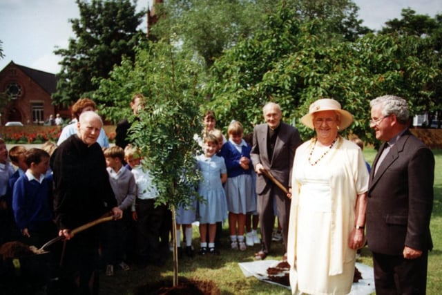 Councillor Sheila Mitchinson Mayor of Doncaster and Fr Gerad Harney Parish Priest of St Peter's in Chains, with Fr James Halpenny, left, and Fr Edward Geaney as they plant a tree to mark their Diamond Jubilee of their ordination into the priesthood back in 1997