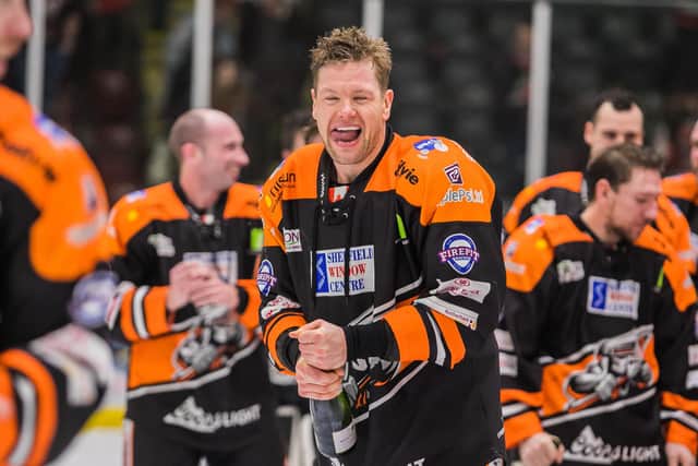 Aaron Johnson celebrating a cup n with Sheffield Steelers