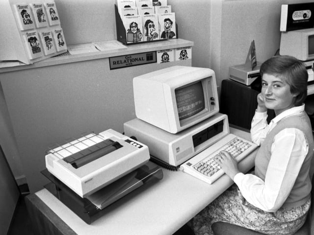 A girl using the new IBM personal computer (with dot matrix printer) at the Micro Centre in Dundee Street Edinburgh, September 1983.