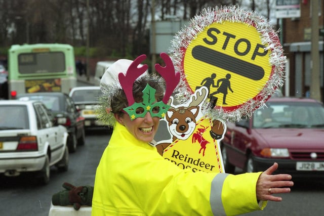 Sunderland lollipop lady Sue Wright had a great i-deer to brighten up the dark mornings.  Sue was the lollipop lady for the Tunstall Road crossing and here she is in 1995 with some festive headwear.