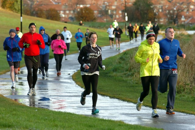 A rainy day on the run but these joggers were still having fun in 2012.