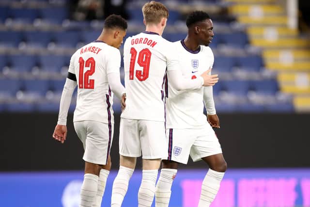 Folarin Balogun of England celebrates scoring the third goal during the UEFA European Under-21 Championship Qualifier match between England U21s and Czech Republic U21s on November 11, 2021 in Burnley, England. (Photo by Lewis Storey/Getty Images)