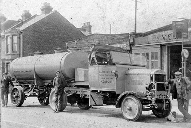 Vic Hutfield, at the front, with coach he modified into a fuel tanker. Photos was taken in 1925 outside his garage which is now Reekies, in Brockhurst Road, Gosport. Picture: Courtesy Brenda Gilbert