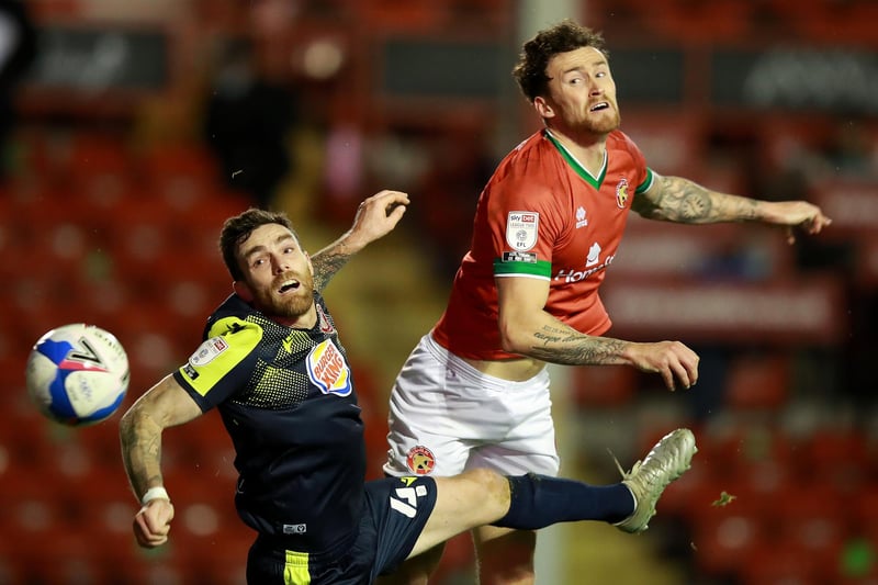 The 26-year-old defender moves to Plymouth from Walsall on an undisclosed-length contract.
A former Birmingham City and Wycombe centre-back, he is the Pilgrims' second signing this summer, after James Wilson completed a move from Ipswich.
Scarr, who turned down an offer to stay at Walsall, is the ninth player to leave the League Two club this summer.
Picture: David Rogers/Getty Images