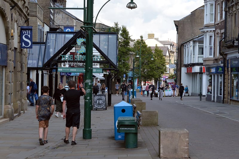 Shoppers return to the town centre once shops reopen.