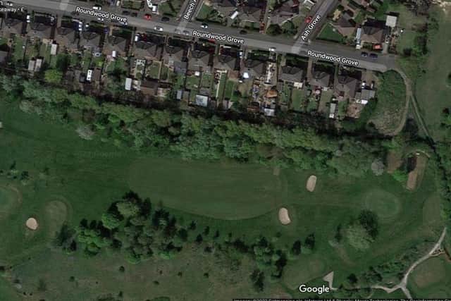 The applicant sought retrospective permission to include a 3.1m wide plot of land between the boundary with Roundwood Golf Course and a number of homes on Roundwood Grove.