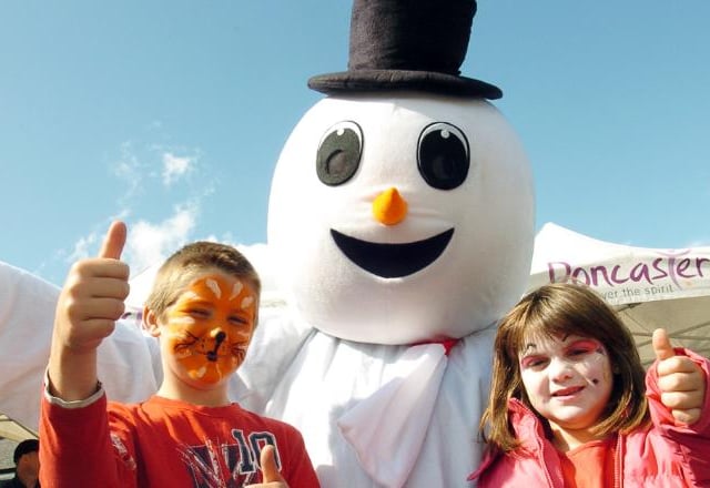 Callum and Caitlin Brown join in with the Christmas celebrations at Doncaster market, 2009.