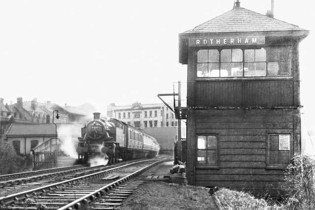 A train is seen departing from Rotherham Westgate in 1952. The train is about to pass over the bridge across the River Don.
