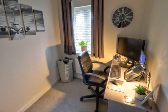 The third bedroom is compact but smart. As you can see, it can easily be turned into an office if you have to work from home.