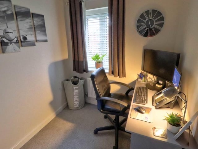 The third bedroom is compact but smart. As you can see, it can easily be turned into an office if you have to work from home.