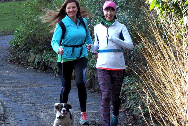 Rummuters (running commuters) in Sheffield: Kate Scott (right) with Jane Langham and Pepper in the Botanical Gardens