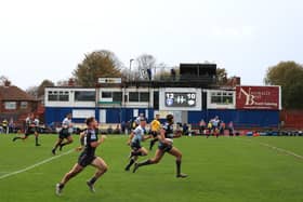 Ben Jones-Bishop sprints away from the Leeds Rhinos defence while playing for Wakefield Trinity in November 2020 (photo by George Wood/Getty Images).