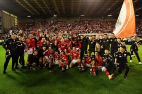BARNSLEY, ENGLAND - MAY 19: The Barnsley team celebrate victory following the Sky Bet League One Play-Off Semi-Final Second Leg match between Barnsley and Bolton Wanderers at Oakwell Stadium on May 19, 2023 in Barnsley, England. (Photo by George Wood/Getty Images)