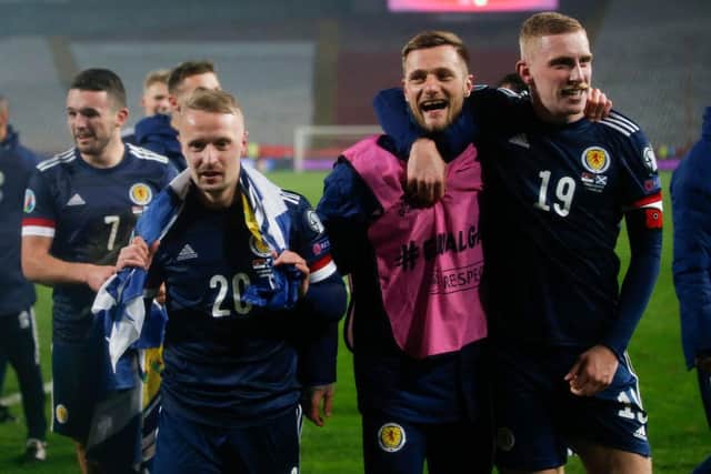 Sheffield United striker Oli McBurnie (R) celebrates Scotland's win in Belgrade over Serbia: Srdjan Stevanovic/Getty Images